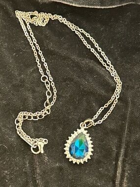 Silver Tone Necklace with Blue Teardrop Pendant and Crystal Halo